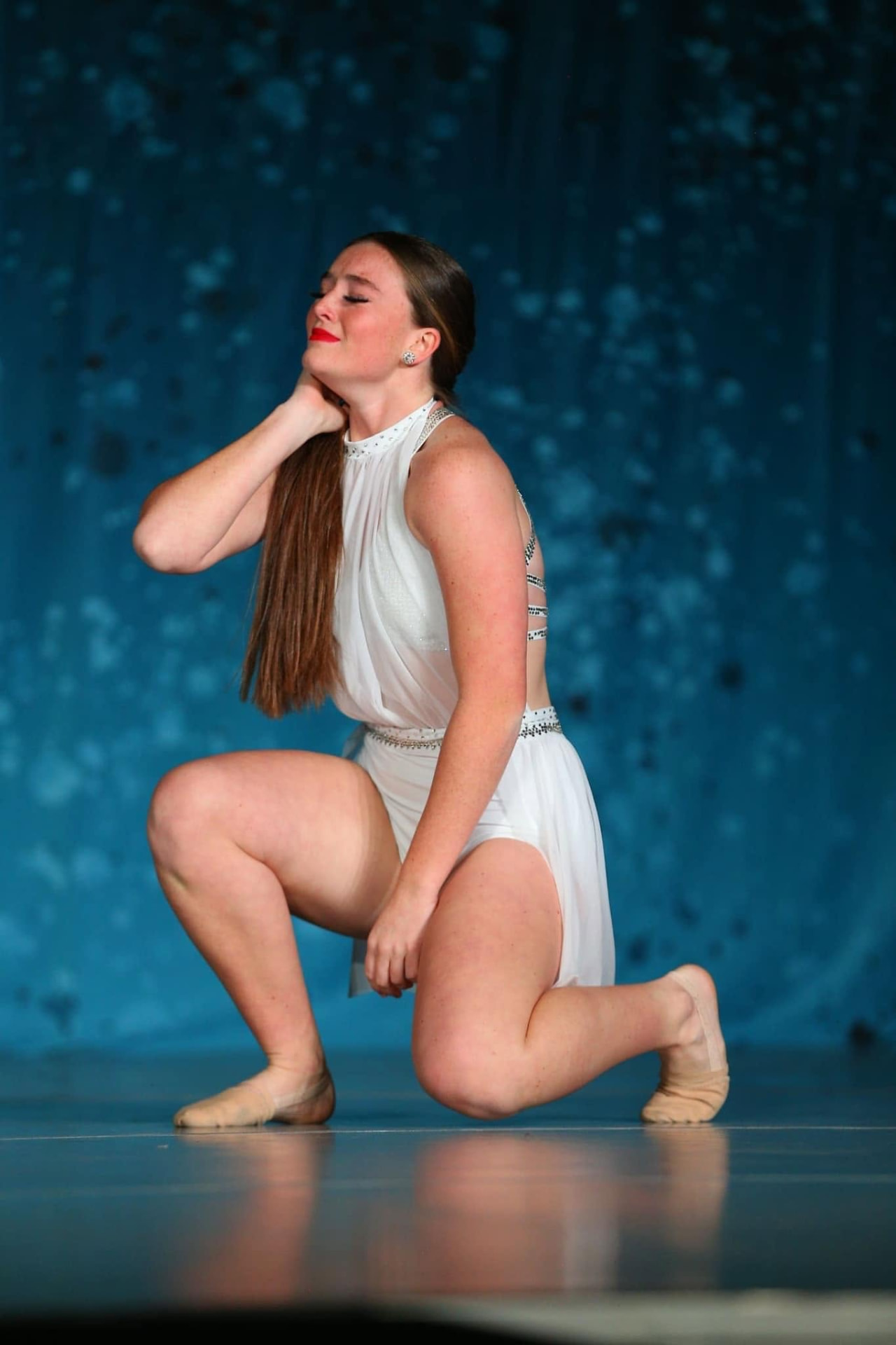 DPAC dancer performing a lyrical solo in white